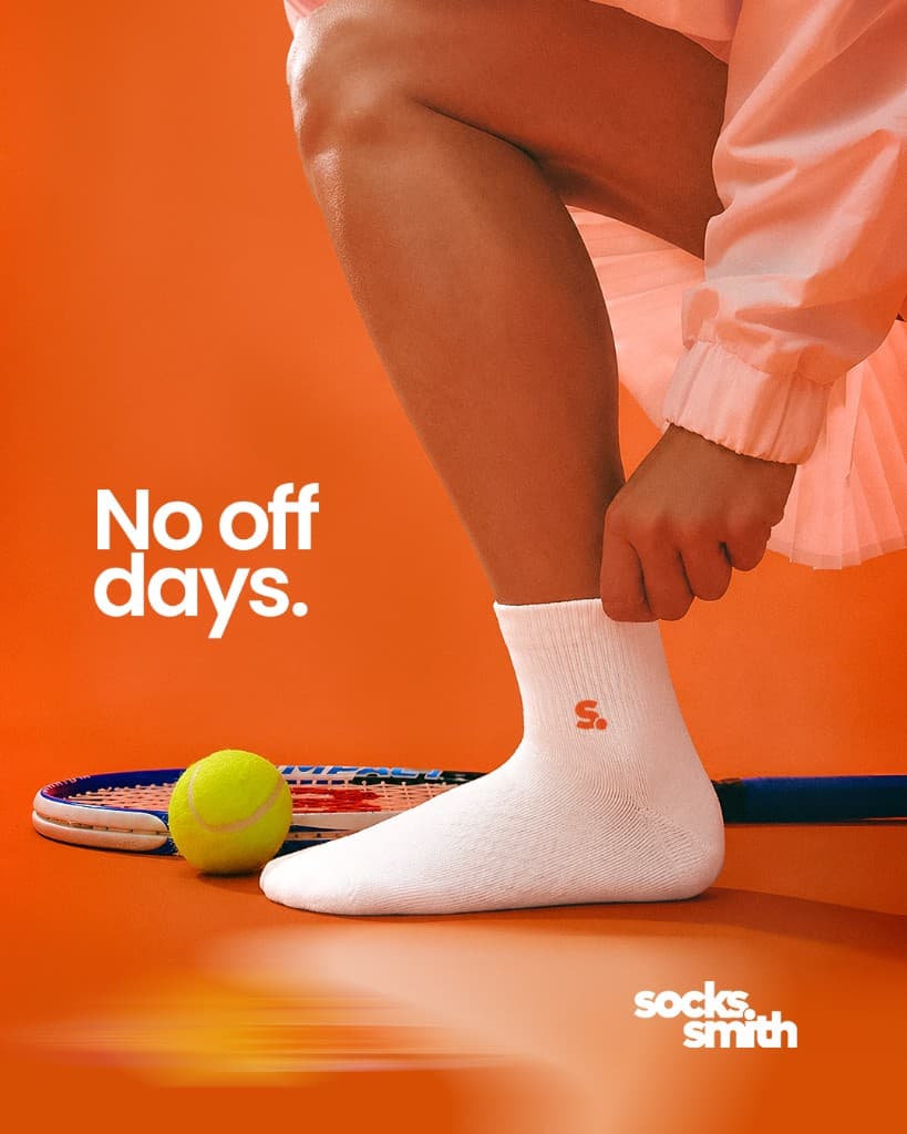 White socks on orange court